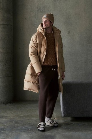Tan Beanie Outfits For Men: For a laid-back look, Reach for a tan puffer coat and a tan beanie. Complete this getup with a pair of grey canvas sandals to make the look more practical.