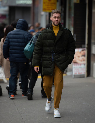 Dark Green Puffer Coat Outfits For Men: This combination of a dark green puffer coat and tobacco chinos is the ultimate casual style for any gentleman. Introduce a pair of white athletic shoes to the equation to keep the outfit fresh.