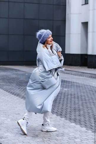 White High Top Sneakers Outfits For Women: Wear a light blue puffer coat with white skinny jeans if you seek to look casual and cool without too much work. Go ahead and complement your ensemble with a pair of white high top sneakers for an air of playfulness.