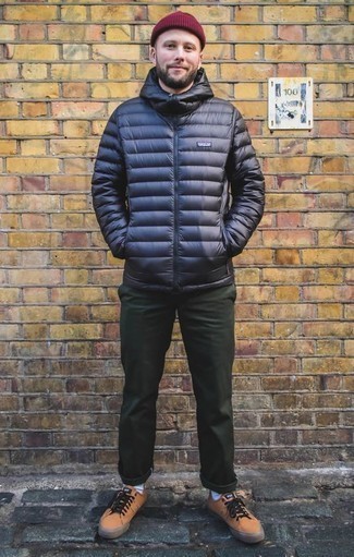 Dark Green Chinos Outfits: This pairing of a navy puffer jacket and dark green chinos is the perfect base for a multitude of classic and casual combos. Go off the beaten path and shake up your outfit with tan leather low top sneakers.