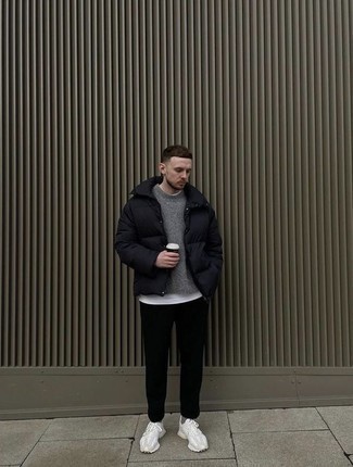 500+ Chill Weather Outfits For Men: Reach for a black puffer jacket and black chinos for a neat sophisticated outfit. When this ensemble looks too polished, tone it down with white athletic shoes.