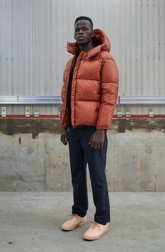 Orange Puffer Jacket Outfits For Men: As you can see, it doesn't take that much effort for a man to look effortlessly smart. Try teaming an orange puffer jacket with navy chinos and be sure you'll look amazing. Add tan leather low top sneakers to the equation to infuse a touch of stylish effortlessness into your ensemble.