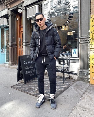 Grey Canvas High Top Sneakers Outfits For Men: A black puffer jacket and black sweatpants are must-have menswear must-haves if you're putting together a casual closet that matches up to the highest fashion standards. Finishing with a pair of grey canvas high top sneakers is a surefire way to add a fun vibe to this look.