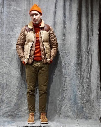 Puffer Jacket Outfits For Men: For an outfit that's worthy of a modern fashion-savvy gent and casually smart, make a puffer jacket and olive chinos your outfit choice. Our favorite of a great number of ways to finish off this getup is with tan suede casual boots.