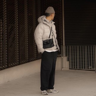 Grey Hoodie Outfits For Men: A grey hoodie and black cargo pants combined together are a wonderful match. Rounding off with a pair of grey athletic shoes is a surefire way to introduce a dash of stylish effortlessness to this outfit.