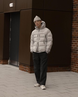 Grey Beanie Outfits For Men: A grey puffer jacket and a grey beanie teamed together are a match made in heaven for those dressers who prefer casually dapper styles. We love how a pair of beige athletic shoes makes this look whole.