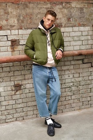 Beige Hoodie Outfits For Men: Try teaming a beige hoodie with light blue jeans for a casual ensemble with a modern take. The whole getup comes together if you complement this outfit with black leather low top sneakers.