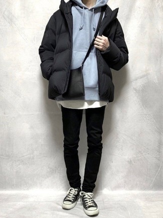 Black Puffer Jacket Outfits For Men: Try teaming a black puffer jacket with black chinos if you seek to look sharp without making too much effort. With shoes, go for something on the relaxed end of the spectrum and complete this outfit with a pair of black and white canvas low top sneakers.
