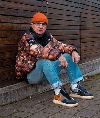 Men's Brown Print Puffer Jacket, Light Blue Jeans, Multi colored Canvas Low Top Sneakers, Orange Beanie