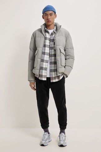 Light Blue Beanie Outfits For Men: Consider teaming a grey puffer jacket with a light blue beanie for relaxed dressing with an edgy finish. The whole ensemble comes together when you complete this ensemble with grey athletic shoes.