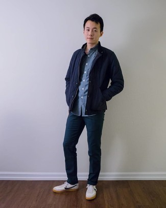 Navy Lightweight Puffer Jacket Outfits For Men: For a casually sleek outfit, wear a navy lightweight puffer jacket and teal chinos — these two pieces fit beautifully together. And if you need to effortlessly dress down this look with a pair of shoes, introduce a pair of white and navy leather low top sneakers to the mix.