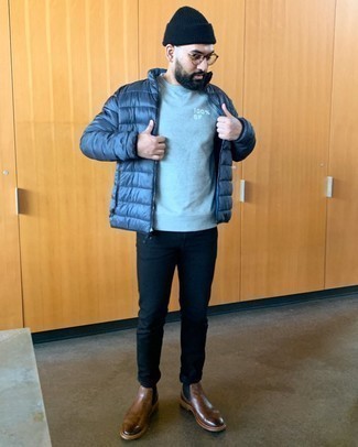 Navy Puffer Jacket Outfits For Men: We're loving how this smart pairing of a navy puffer jacket and navy jeans immediately makes men look on-trend. To give this ensemble a dressier twist, complement this look with a pair of brown leather chelsea boots.
