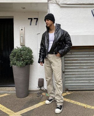 Men's Black Leather Puffer Jacket, White Tank, Beige Jeans, Black and White Canvas Low Top Sneakers