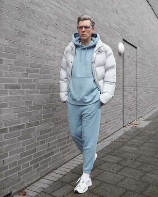 Light Blue Track Suit Outfits For Men: A light blue track suit and a white puffer jacket worn together are a match made in heaven. Add a pair of white athletic shoes to the mix to inject a dash of stylish casualness into your outfit.