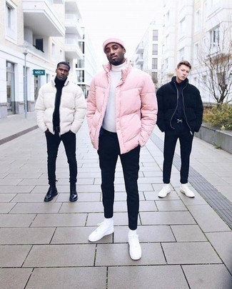 Pink Puffer Jacket Outfits For Men: A pink puffer jacket and black chinos matched together are a good match. Give a more relaxed twist to an otherwise mostly dressed-up look with a pair of white low top sneakers.
