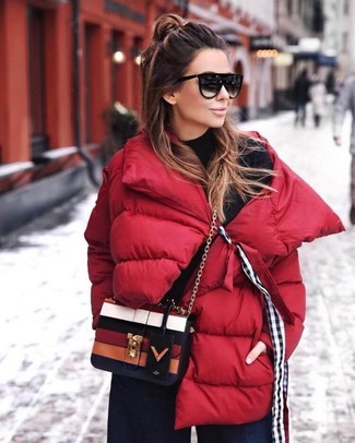 Multi colored Leather Crossbody Bag Outfits: Pair a red puffer jacket with a multi colored leather crossbody bag for a trendy and edgy outfit.