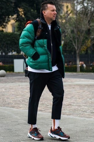 Dark Green Puffer Jacket Outfits For Men: Go for a straightforward yet seriously stylish outfit by opting for a dark green puffer jacket and navy chinos. Wondering how to finish off? Introduce a pair of orange athletic shoes to the equation for a more laid-back finish.