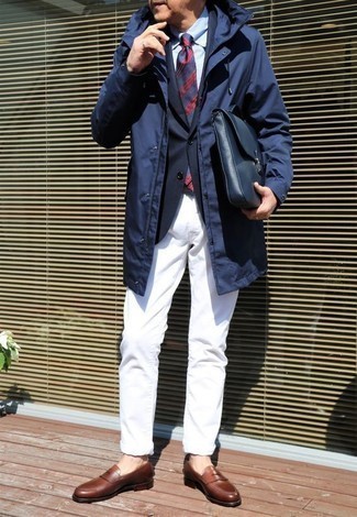 Briefcase Outfits: A navy raincoat and a briefcase are a smart combo to integrate into your current casual routine. For a fashionable hi/low mix, complement this ensemble with dark brown leather loafers.