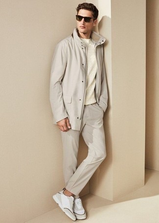 White Cable Sweater Outfits For Men: Why not reach for a white cable sweater and grey chinos? As well as totally functional, both of these pieces look amazing paired together. Make this ensemble less formal by rounding off with a pair of white athletic shoes.