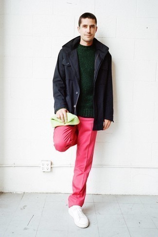 Black Raincoat Outfits For Men: To assemble a casual outfit with a modern spin, pair a black raincoat with hot pink chinos. Let your sartorial credentials truly shine by rounding off this look with a pair of white canvas low top sneakers.