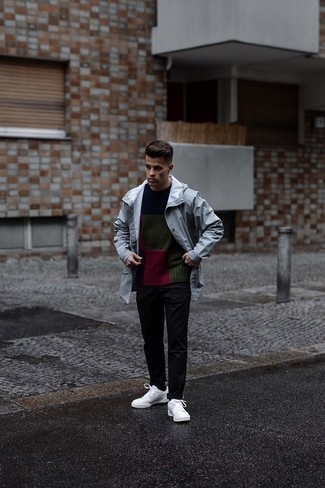 Charcoal Raincoat Outfits For Men: This relaxed pairing of a charcoal raincoat and black chinos couldn't possibly come across other than outrageously sharp. Introduce a pair of white canvas low top sneakers to the equation and you're all done and looking amazing.