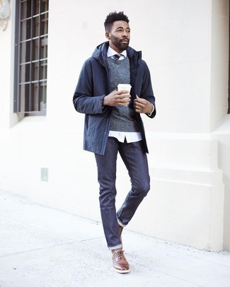 Brown Leather Brogues Outfits: A navy raincoat and navy jeans matched together are a wonderful match. To give your look a more sophisticated twist, complete this ensemble with a pair of brown leather brogues.