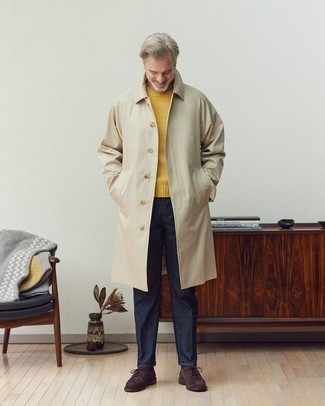 Raincoat Outfits For Men: This casual pairing of a raincoat and navy jeans is super easy to throw together without a second thought, helping you look amazing and prepared for anything without spending a ton of time digging through your wardrobe. For a more elegant twist, complete your ensemble with a pair of dark brown suede derby shoes.