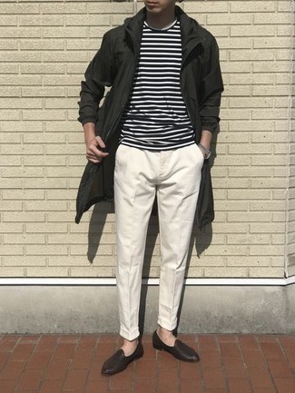 Olive Raincoat Outfits For Men: If you're on the lookout for a relaxed but also seriously stylish getup, reach for an olive raincoat and white chinos. And if you wish to instantly kick up this ensemble with one single piece, complete your look with a pair of dark brown leather loafers.