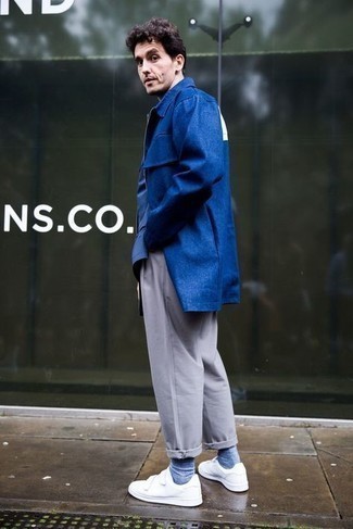 Navy Raincoat Outfits For Men: This pairing of a navy raincoat and grey chinos is great for lazy days. Complete this outfit with white canvas low top sneakers and the whole look will come together.