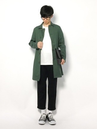 Dark Green Raincoat Outfits For Men: This laid-back pairing of a dark green raincoat and black chinos is a real life saver when you need to look great in a flash. For extra fashion points, introduce a pair of black and white canvas low top sneakers to the equation.