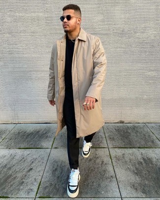 Beige Raincoat Outfits For Men: A beige raincoat and black chinos are absolute menswear staples if you're putting together an off-duty wardrobe that matches up to the highest sartorial standards. White and black leather low top sneakers tie the getup together.