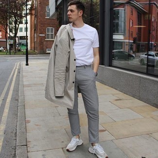 Grey Raincoat Outfits For Men: Such essentials as a grey raincoat and grey check chinos are the ideal way to inject understated dapperness into your casual styling repertoire. And if you need to instantly tone down your outfit with footwear, why not enter grey athletic shoes into the equation?
