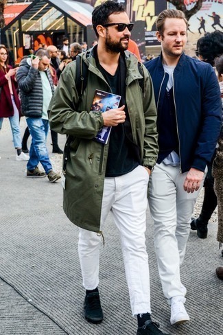 Olive Raincoat Outfits For Men: This combo of an olive raincoat and white jeans will cement your expertise in menswear styling even on dress-down days. Black canvas low top sneakers look wonderful completing this outfit.