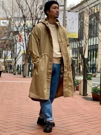 Beige Raincoat Outfits For Men: Such items as a beige raincoat and blue jeans are the perfect way to infuse effortless cool into your casual styling arsenal. If you feel like dressing up a bit now, complement this look with a pair of black leather desert boots.