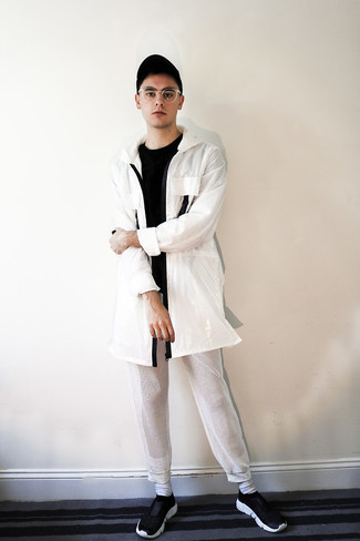 White Sweatpants Outfits For Men: This urban combination of a white raincoat and white sweatpants is extremely easy to put together without a second thought, helping you look seriously stylish and prepared for anything without spending a ton of time going through your wardrobe. Want to tone it down when it comes to footwear? Complement your outfit with black and white athletic shoes for the day.