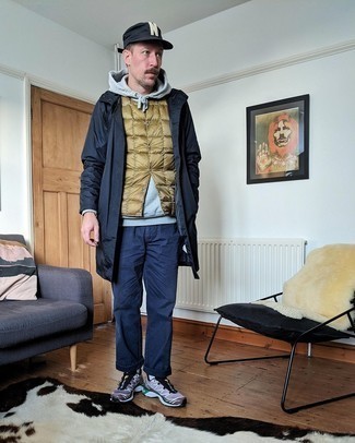 Beige Quilted Gilet Outfits For Men: If you don't like spending too much time on your ensembles, pair a beige quilted gilet with navy chinos. Add a playful feel to this look by wearing brown athletic shoes.
