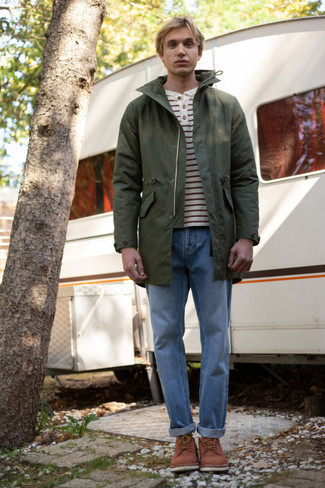 Olive Raincoat Outfits For Men: Fashionable and functional, this off-duty pairing of an olive raincoat and blue jeans will provide you with wonderful styling opportunities. Go off the beaten path and shake up your look by slipping into brown suede derby shoes.