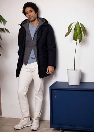Navy Raincoat Outfits For Men: For a laid-back and cool outfit, opt for a navy raincoat and white jeans — these items play beautifully together. If you want to instantly dress down your look with footwear, why not complement this ensemble with beige athletic shoes?