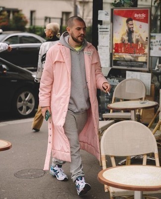 Hot Pink Coat Outfits For Men: Why not pair a hot pink coat with grey sweatpants? These items are very practical and look amazing when worn together. Finish your outfit with white and navy athletic shoes to serve a little mix-and-match magic.