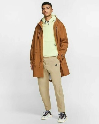 Men's Brown Raincoat, Mint Hoodie, Tan Sweatpants, White and Black Athletic Shoes