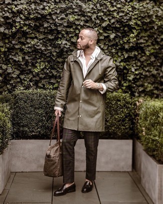 Olive Raincoat Outfits For Men: To pull together a laid-back look with a modern spin, pair an olive raincoat with dark brown plaid chinos. Puzzled as to how to finish this ensemble? Finish off with a pair of dark brown leather tassel loafers to turn up the classy factor.