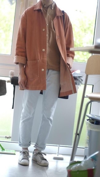 Men's Orange Raincoat, Tan Long Sleeve Shirt, Light Blue Jeans, White Leather Low Top Sneakers