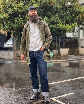 Olive Raincoat Outfits For Men: This combo of an olive raincoat and navy jeans will prove your expertise in menswear styling even on dress-down days. Hesitant about how to complete your outfit? Rock black leather casual boots to ramp up the fashion factor.
