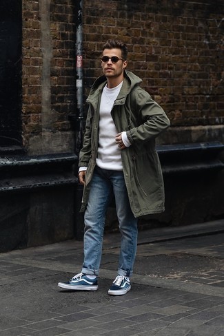 Olive Raincoat Outfits For Men: If you prefer casual style, why not take this combination of an olive raincoat and blue jeans for a walk? Complement this outfit with a pair of blue canvas low top sneakers and the whole ensemble will come together.