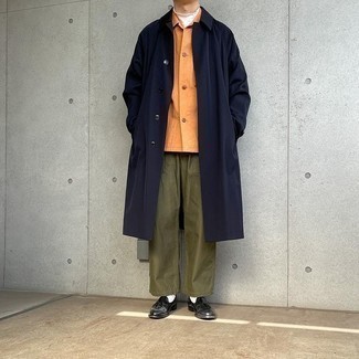 Men's Outfits 2021: Wear a navy raincoat with an orange shirt jacket for a neat polished outfit.