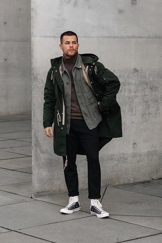 Olive Raincoat Outfits For Men: On days when comfort is paramount, consider wearing an olive raincoat and black chinos. When this look is too much, dial it down by finishing with a pair of white and black canvas high top sneakers.