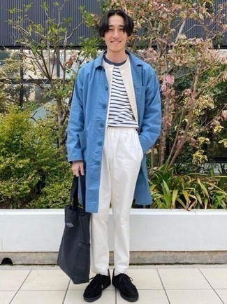 Black Canvas Tote Bag Outfits For Men: A blue raincoat and a black canvas tote bag are great menswear staples to integrate into your casual styling routine. Add black suede low top sneakers for an extra dose of style.