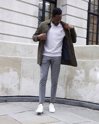 White Sweatshirt Outfits For Men: If you're searching for a casual but also seriously stylish outfit, make a white sweatshirt and grey chinos your outfit choice. A pair of white canvas low top sneakers is a nice idea to complement your look.