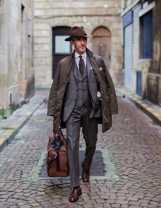 Dark Brown Socks Outfits For Men: Wear a dark brown raincoat with dark brown socks for a stylish and easy-going look. Complement this outfit with brown leather tassel loafers for an added dose of refinement.