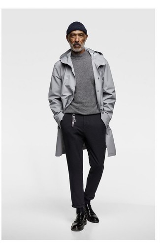 Raincoat Outfits For Men: This combination of a raincoat and black chinos resonates laid-back attitude and stylish functionality. If you wish to instantly step up this outfit with one single piece, complete this ensemble with black leather derby shoes.